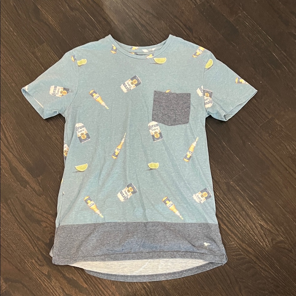 Modern Amusement Light Blue Graphic Tee with Pocket
